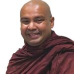 Smiling Buddhist Monk